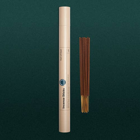 Earl of East incense sticks pictured next to a branded recyclable branded tube.