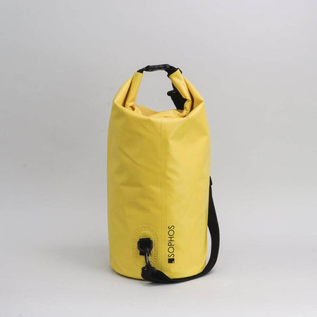 Yellow dry bag with a black strap on a light gray background