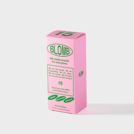 Pink box of Blomb perfume with green text on a white background