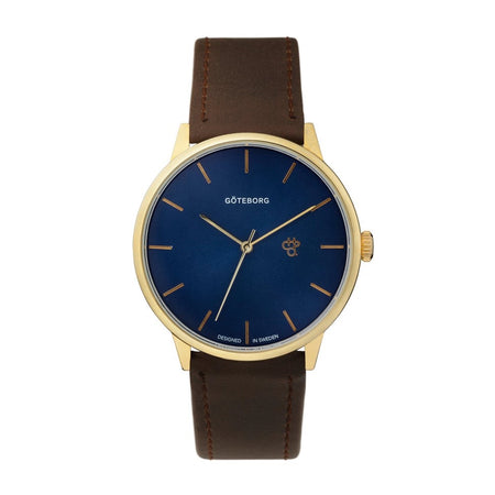 Watch with blue dial, gold case, and brown leather strap on a white background