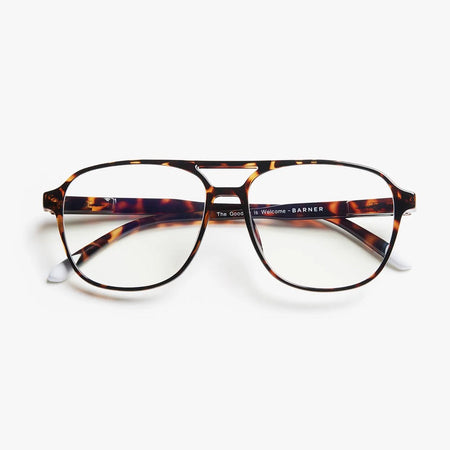 Tortoiseshell eyeglasses on a white background
