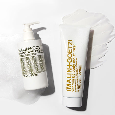 Two Malin+Goetz skincare products on a white background