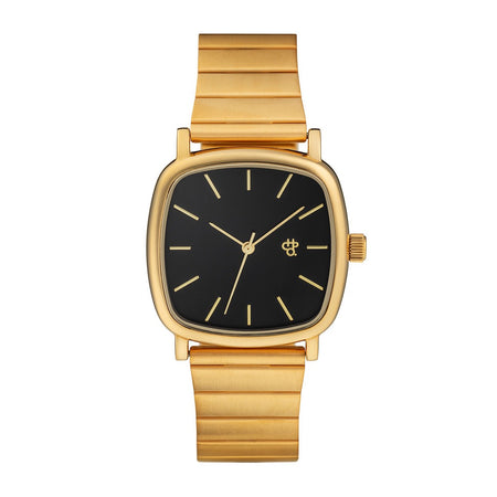 Lara Gold watch with black face, gold case and gold steel strap on a white background