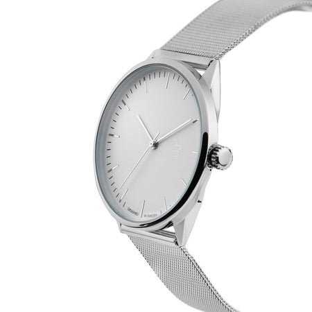 Silver watch with a mesh band on a white background