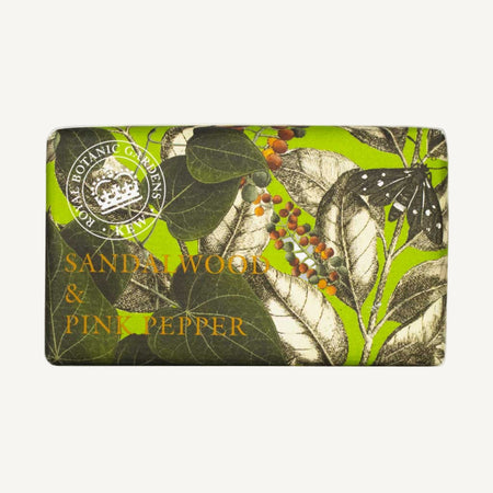 Soap bar with sandalwood and pink pepper scent  and Royal Botanic Gardens Kew logo on a green background