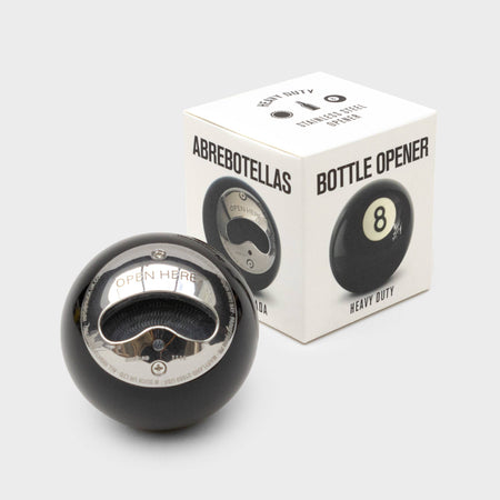 The Eight Ball Bottle Opener is part gadget, part icon, and 100% conversation starter. Crafted from a genuine black number eight pool ball. Bottle opener shaped like a pool ball with packaging box on a white background.