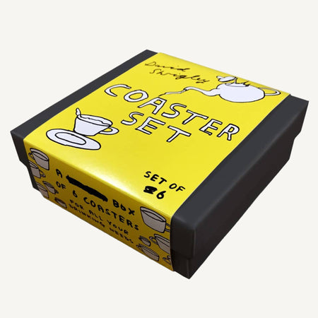 Box of six David Shrigley assorted coasters with yellow and black design on a white background
