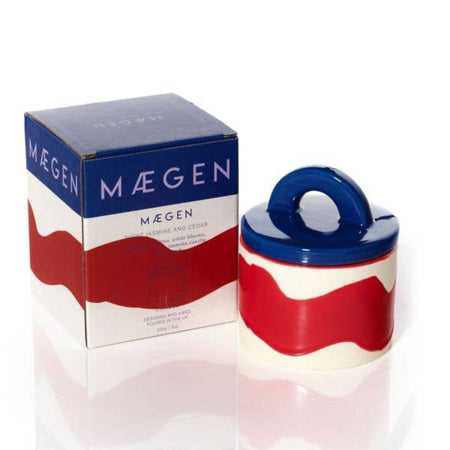 Red and blue painted ceramic pot with matching lid and branded gift box labeled 'Máegen' on a white background. The pot becomes a trinket box after use.