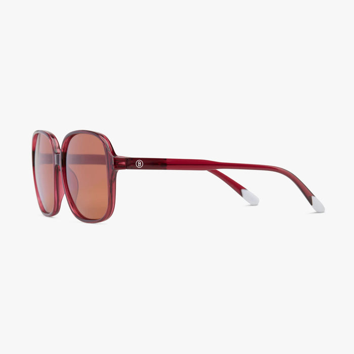 Red sunglasses with a white logo on a white background