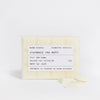 Rosemary wax melt with label on a white background
