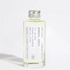 Pumpkin spice diffuser oil in a glass bottle on a white background