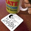 Mug with colorful text and a coaster with a graphic and text on a wooden surface