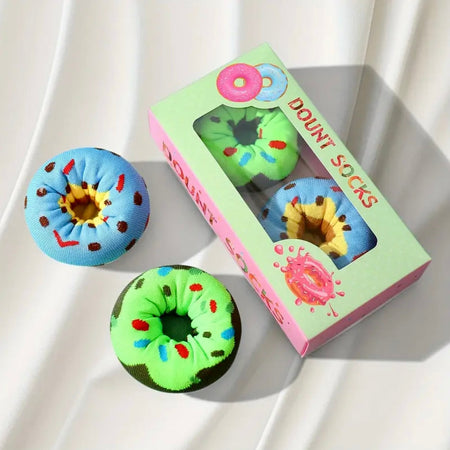 Colorful donut-shaped socks with a box labeled 'Dount Socks' on a white background