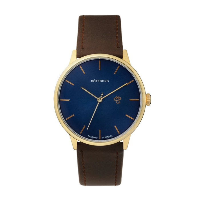 Watch with blue dial, gold case, and brown leather strap on a white background
