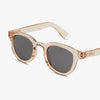 Pink sunglasses with dark lenses on a white background