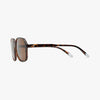 Sunglasses with tortoiseshell frame and brown lenses on a white background