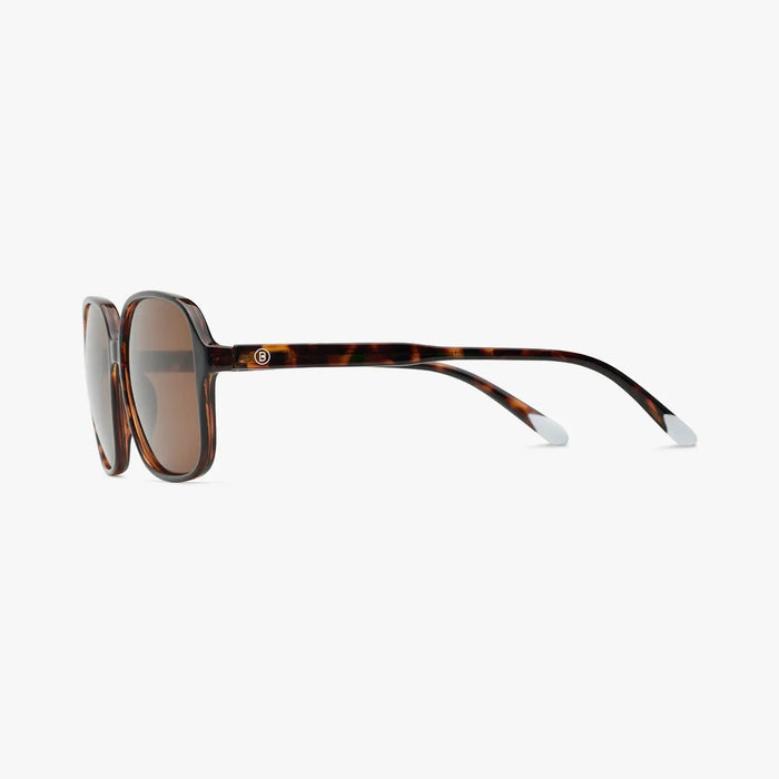 Sunglasses with tortoiseshell frame and brown lenses on a white background