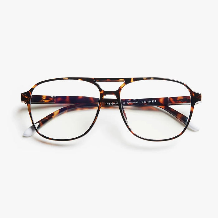 Tortoiseshell eyeglasses on a white background