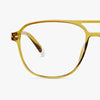 Olive framed eyeglasses on a white background