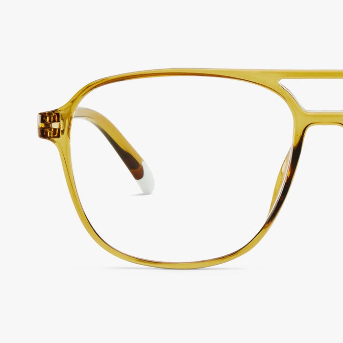 Olive framed eyeglasses on a white background