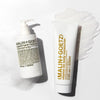 Two Malin+Goetz skincare products on a white background
