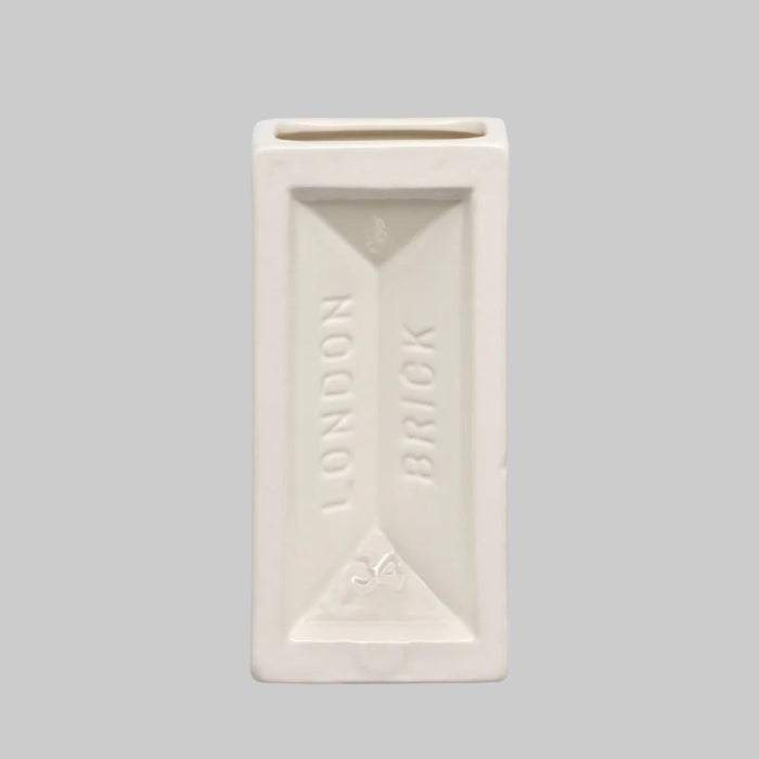 Rectangular white vase with 'LONDON BRICK' branding on a light gray background