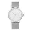 Silver watch, white face with a stainless steel mesh band on a white background