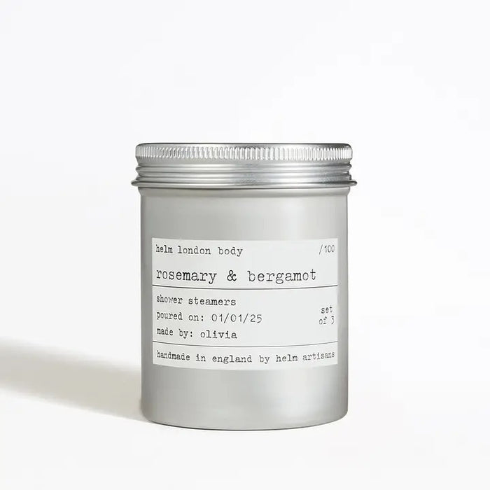 Rosemary and bergamot shower steamers in a screw top aluminium container with a label on a white background
