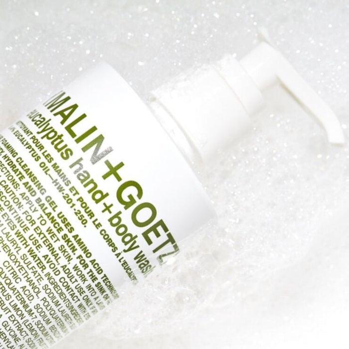MALIN + GOETZ eucalyptus hand and body wash packaging with branding on a white background
