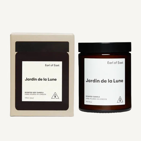 Earl of East candle on the right with its gift box on the left.