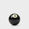 A photo of a black 8-ball. The Eight Ball Bottle Opener is part gadget, part icon, and 100% conversation starter. Crafted from a genuine black number eight pool ball. 