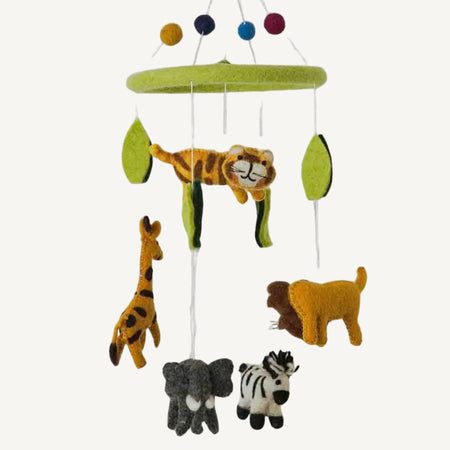 Children's animal mobile with various animals including a lion, a tiger, a giraffe, an elephant and a zebra with leaves and felt balls hanging from a green felt covered ring on a white background