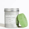 Aluminium screw top container of peppermint & herb shower steamers with a green steamer on a white background