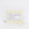Helm London tobacco and vanilla wax melt bar with label on a white background