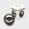 The Eight Ball Bottle Opener is part gadget, part icon, and 100% conversation starter. Crafted from a genuine black number eight pool ball. Bottle opener shaped like a pool ball with packaging box on a white background.